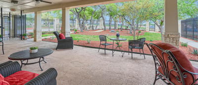 Outdoor seating area with a garden view