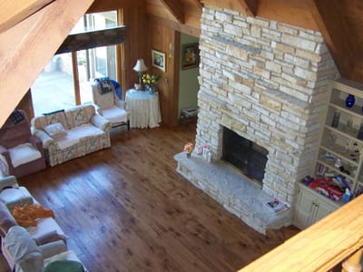 Interior view of a cozy common area with a fireplace