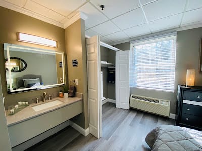 Interior view of a private resident room with a bathroom