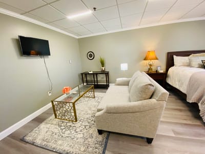 A cozy interior room with a sofa and decorative elements