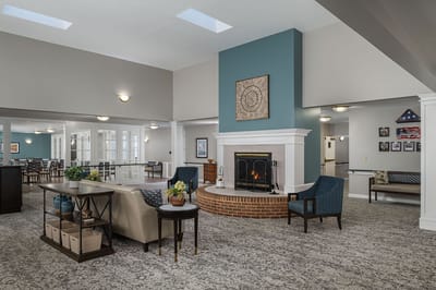 Common area with a fireplace and seating