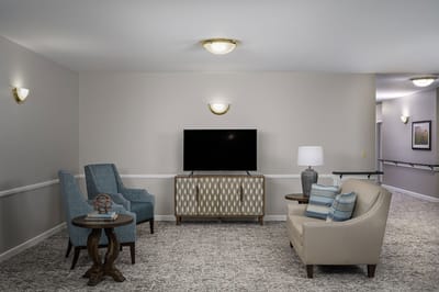 Interior common area with seating and television