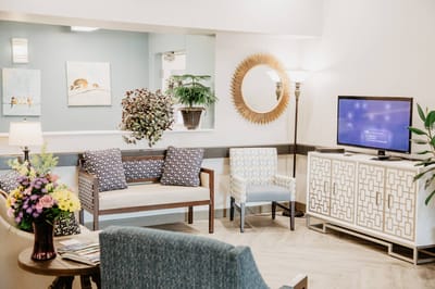 Bright common area with seating and decor