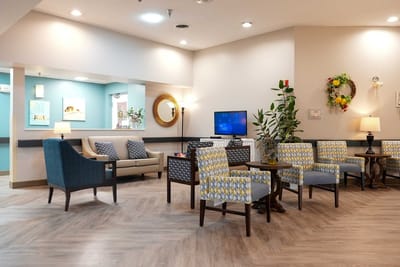 Bright common area with comfortable seating and decor
