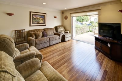 Living room area with seating and open door