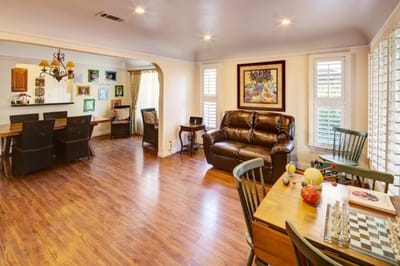 Bright common area with furniture and artwork