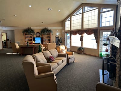 Bright common area with seating and windows