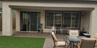 Patio area with furniture and artificial grass