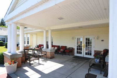 Exterior entrance with seating and planters