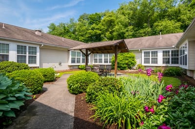 Garden area with seating and flowers in bloom