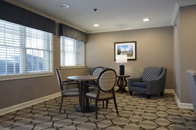 Cozy common area with seating and table