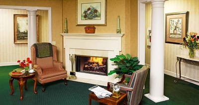Cozy common area with a fireplace and seating