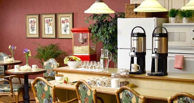 A cozy dining area with coffee and snacks