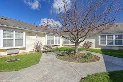 Outdoor courtyard with seating and landscaping