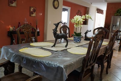 Decorative dining table set with a centerpiece