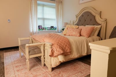 Cozy resident room with a well-made bed