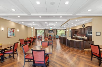 Bright dining area with tables and chairs