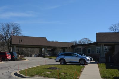 Exterior view of The Cortland Riverside Gardens parking area