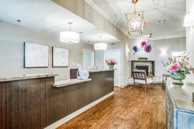 Interior lobby area with flowers and seating