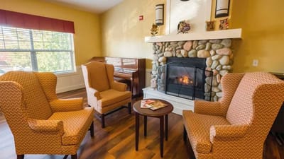 Cozy common area with a fireplace and seating