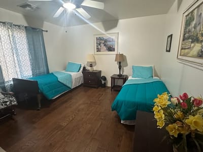 Shared resident room with two beds and decor