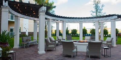 A beautiful outdoor seating area with a fire pit