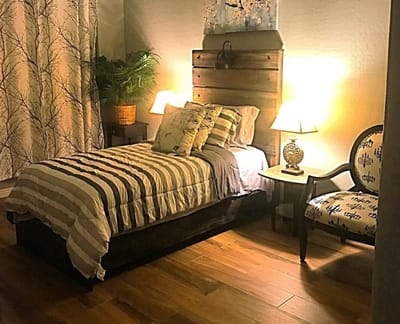 Cozy private bedroom with warm lighting