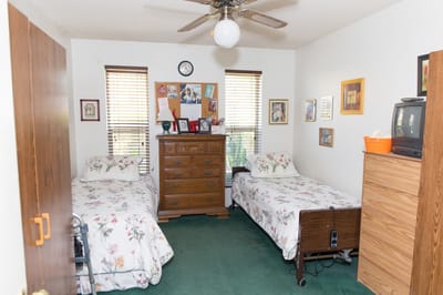 Shared resident room with two beds and personal decor