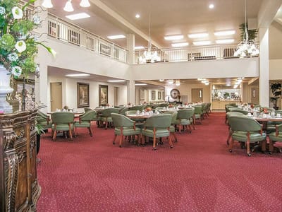 Dining area with tables set for meals