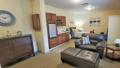 Cozy and inviting resident room with furniture
