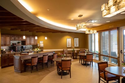 Bright dining area with tables and seating