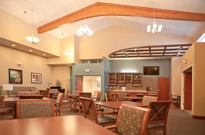 Interior common area with tables and chairs