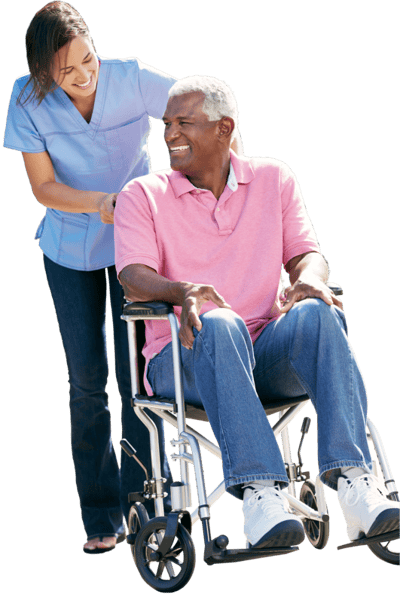 Caregiver assisting a resident in a wheelchair