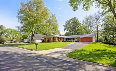 Exterior view of a residential facility on a sunny day.