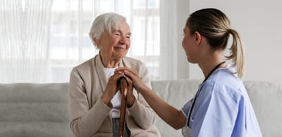 Nurse interacting with an elderly resident