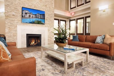 Interior view of a cozy common area with a fireplace