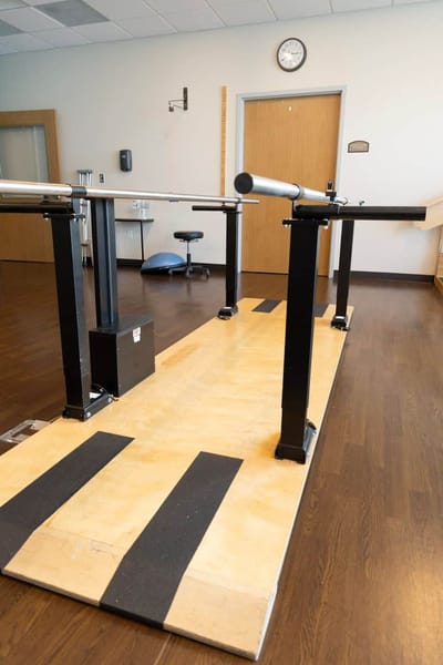 Physical therapy equipment in a bright interior space