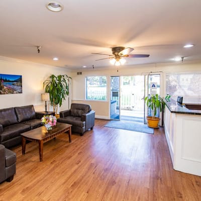 Bright lobby area with couches and large windows