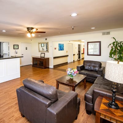 Interior view of a cozy common area with seating