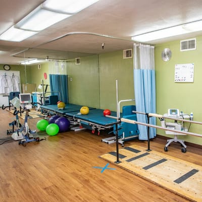 Interior view of a therapy room with equipment