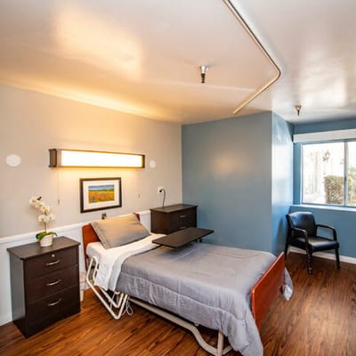Private resident room with bed and window.