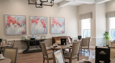Bright dining room with artistic decor and dining settings
