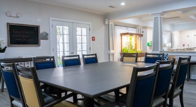 Common area with dining table and chairs