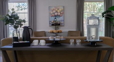 A dining area with refreshments and decor