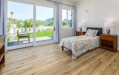 Bright bedroom with view of outdoor space