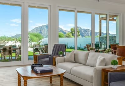 Bright common area with views of the outdoors and mountains