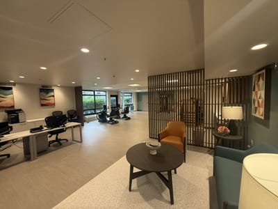 Interior view of a modern common area with exercise equipment