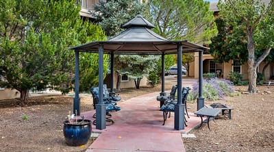 Outdoor gazebo seating area in a garden