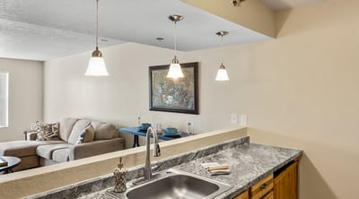 Bright and clean interior common area with a kitchen sink