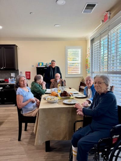 Residents enjoying a meal in a dining area